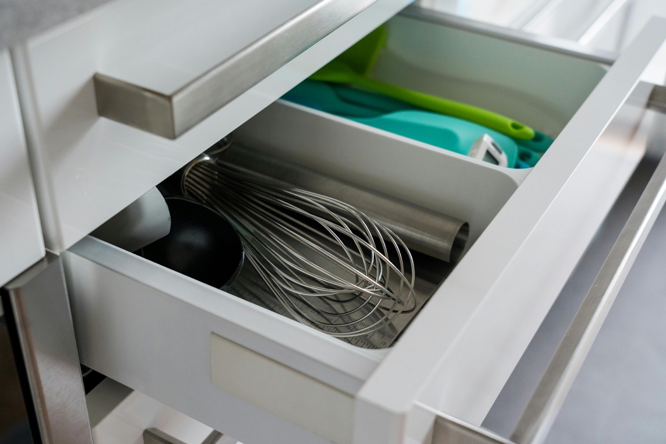Organized kitchen drawer with utensil dividers