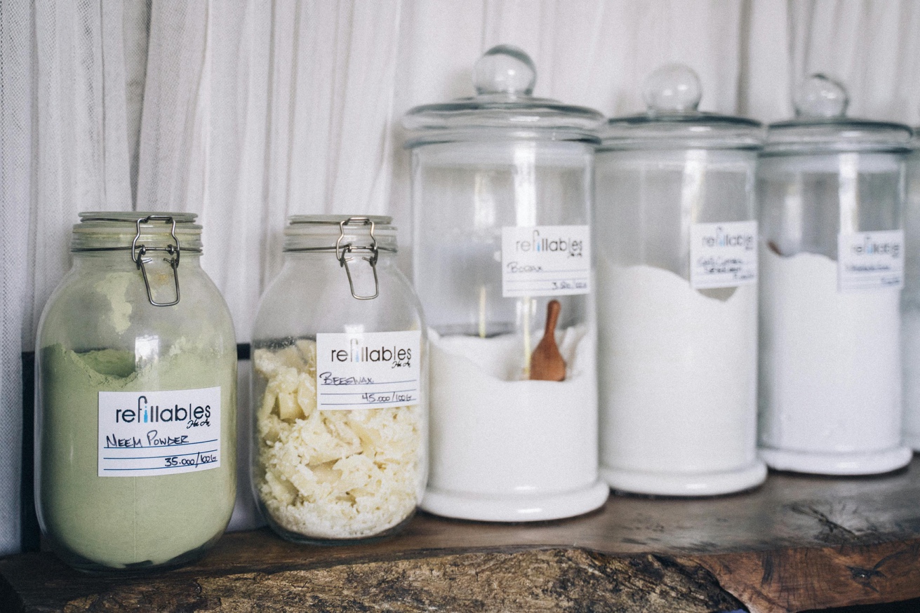Organized pantry with labeled glass jars